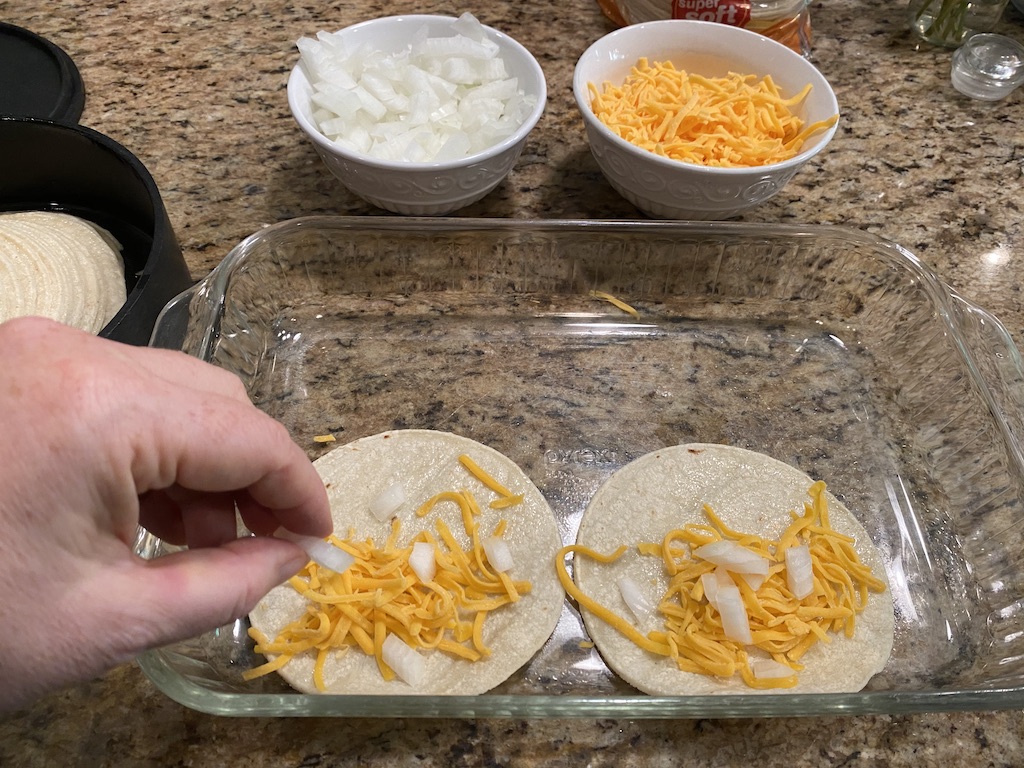 Assembling Easy Cheesy Enchiladas