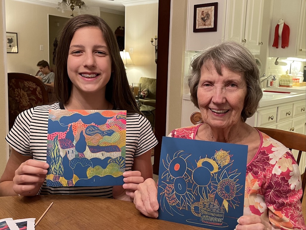 Abby and Nana with their artwork